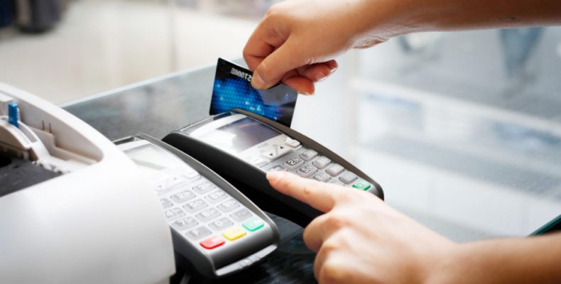 Card payment with chip and pin machine in shop